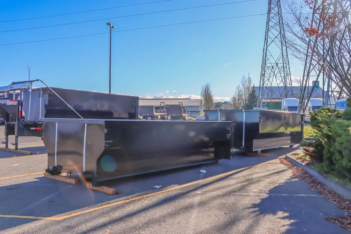 Roll-off dumpster ready for waste disposal at job site for 2 Yard Dumpster Rental in Green Hill